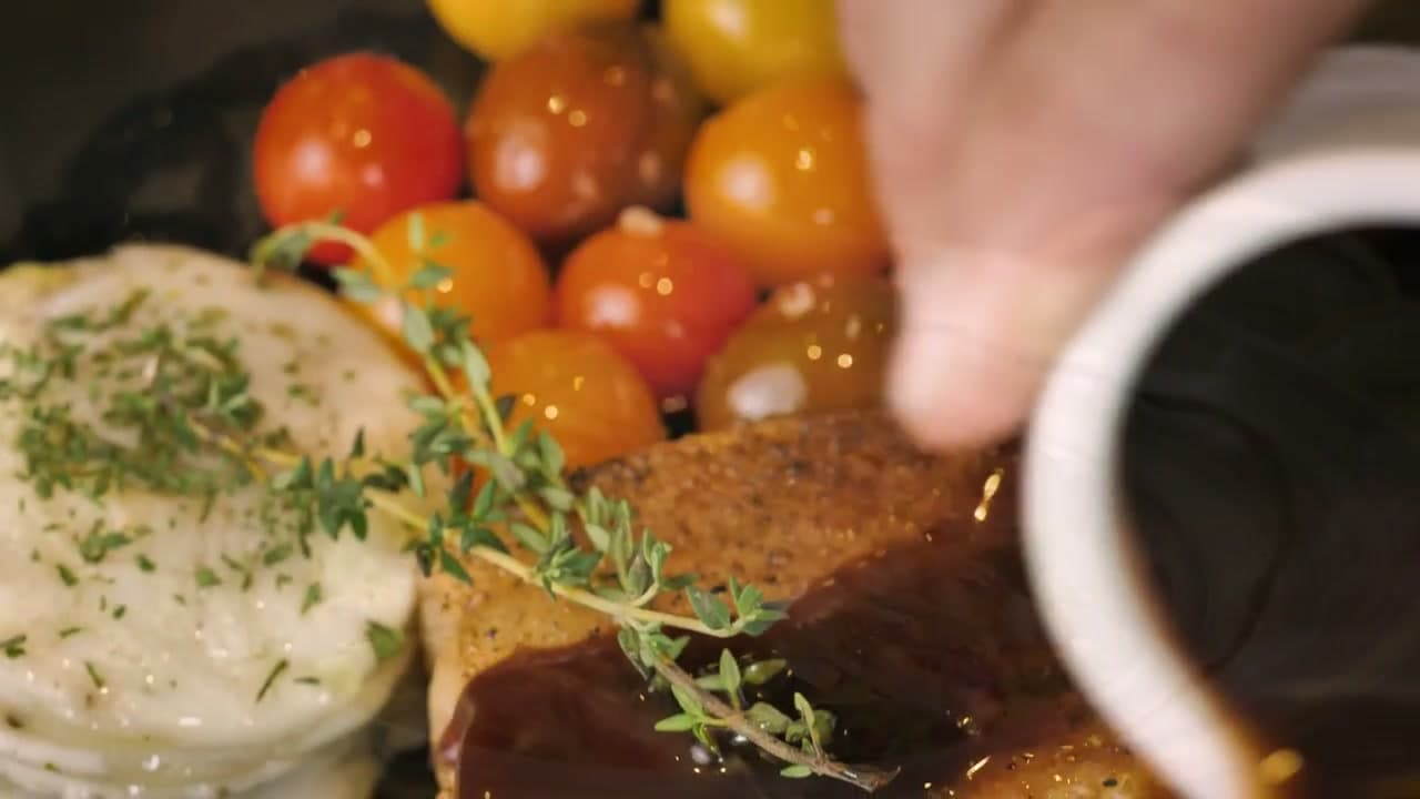Sauce poured over a seared plate